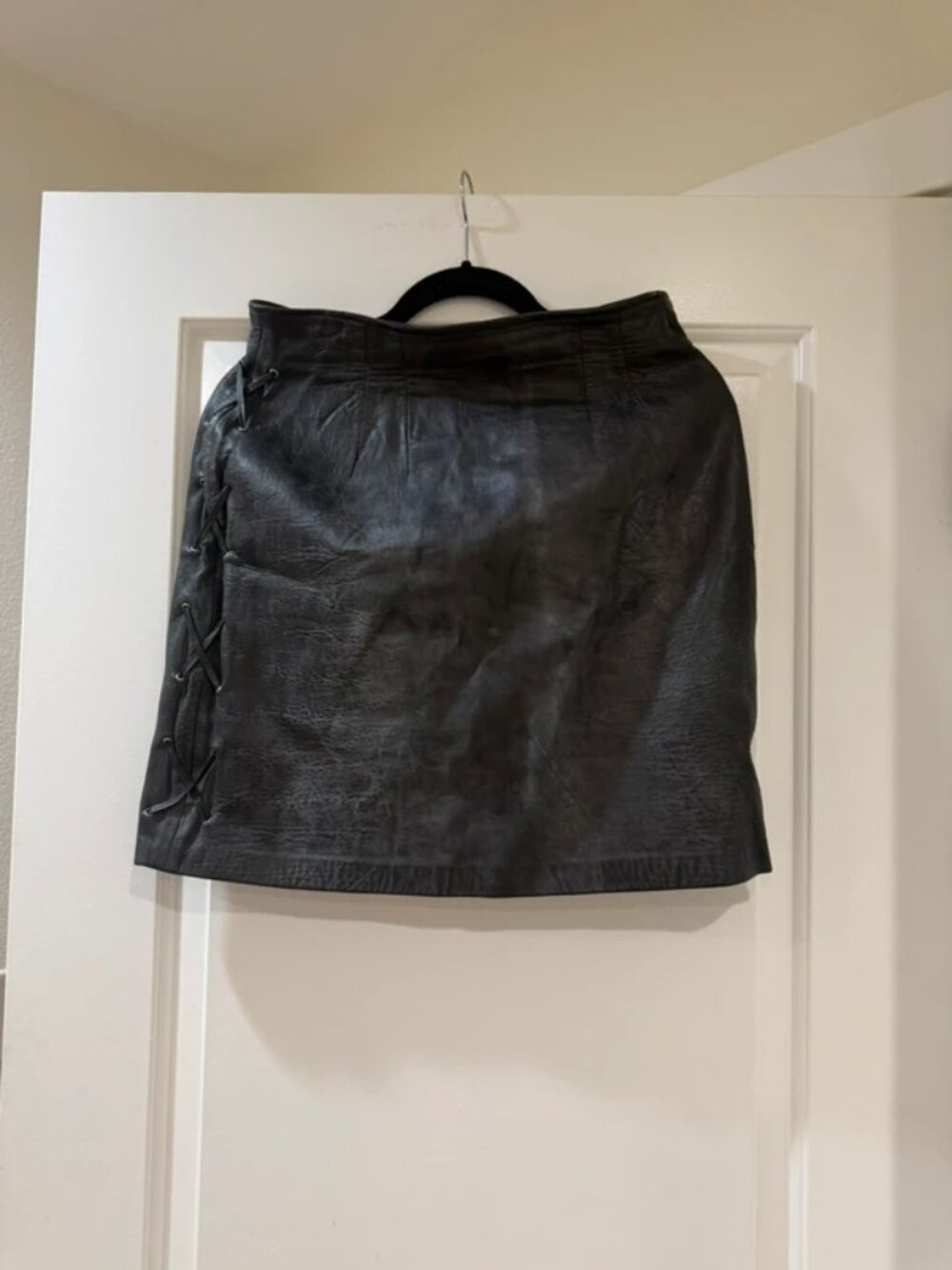 Cute leather mini skirt.